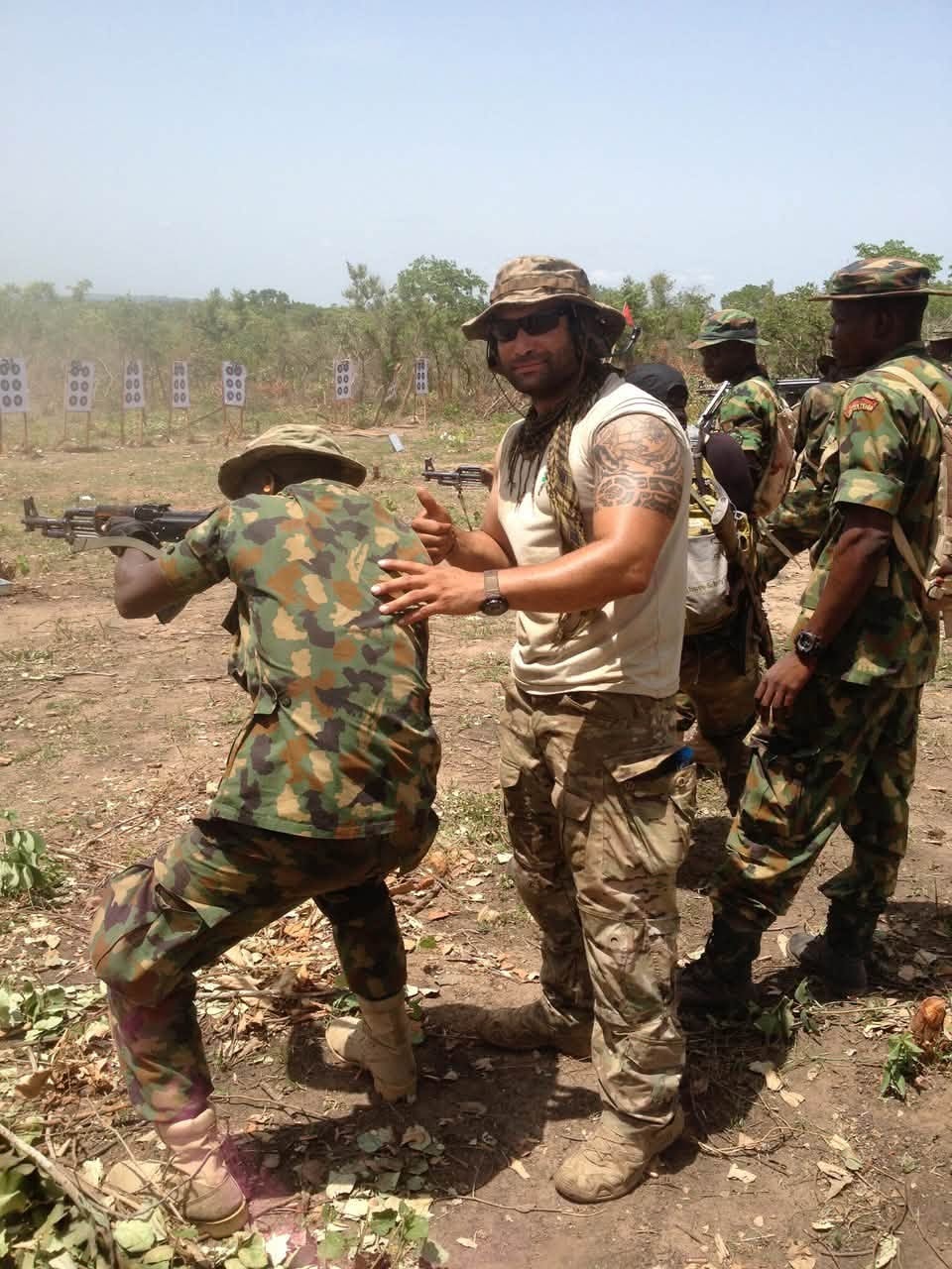 Sam training foreign forces at a firing range